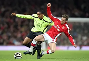 Arsenal V Wigan Carling Cup 2008-9 Prints: Arsenal's Triumph: Mark Randall's Dominance Over Wilson Palacios in the Carling Cup Clash (3-0)