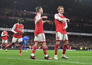 Images Dated 1st March 2023: Arsenal's Triumph: Odegaard and Trossard Celebrate Third Goal Against Everton (2022-23)