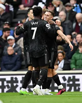 Arsenal's Triumph: Odegaard and Trossard Celebrate Third Goal vs Fulham (2022-23)