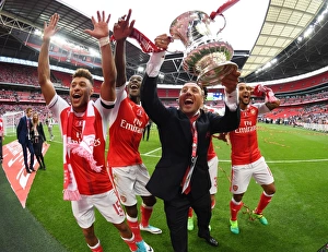 Arsenal's Triumph: Oxlade-Chamberlain, Welbeck, and Cazorla Celebrate FA Cup Victory