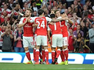 Images Dated 24th September 2016: Arsenal's Triumph: Ozil, Sanchez, and Bellerin's Goal Celebration vs. Chelsea (2016-17)