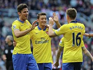 Arsenal's Triumph: Ramsey, Giroud, Ozil Celebrate Goals Against Sunderland (2013-14)