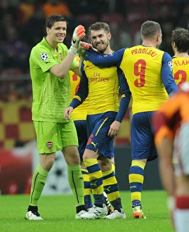 Arsenal's Triumph: Ramsey, Podolski, Szczesny Celebrate Goals Against Galatasaray in Champions League