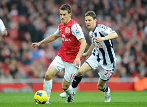 Arsenal V West Bromwich Albion 2011-12 Prints: Arsenal's Triumph: Ramsey's Brilliance Leads to 3-0 Victory over West Bromwich Albion in the Premier League