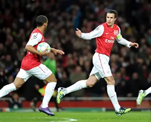 Arsenal's Triumph: Rvp and Walcott's Goals Secure 3-0 Victory Over AC Milan in UEFA Champions League