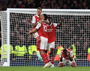 Arsenal's Triumph: White, Saliba, Partey Celebrate Victory over Liverpool in 2022-23 Premier League