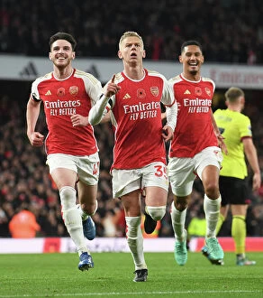 Arsenal v Burnley 2023-24 Collection: Arsenal's Triumph: Zinchenko, Rice, and Saliba's Epic Goal Celebration (2023-24)
