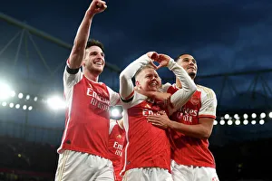 Arsenal's Triumph: Zinchenko, Rice, and Saliba Celebrate Third Goal vs Burnley (2023-24)