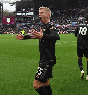 Arsenal's Triumphant Third Goal: An Own Goal by Villa's Martinez