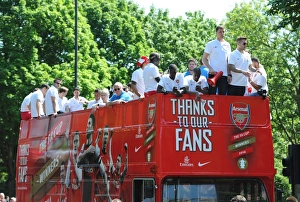 Arsenal Trophy Parade 2014 Prints: Arsenal's Triumphant Parade with the 2014 Trophy in Islington