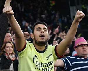 West Ham United V Arsenal 2021-22 Prints: Arsenal's Triumphant Return: Euphoric Fans Celebrate Victory Over West Ham in London's Premier League Showdown