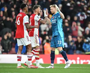 Arsenal's Triumphant Team: Celebrating a Hard-Fought Victory Over Watford (2021-22)