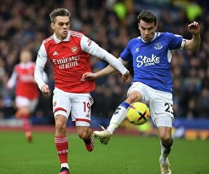 Everton v Arsenal 2022-23 Collection: Arsenal's Trossard Clashes with Everton's Coleman in Premier League Showdown