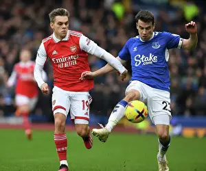 Everton V Arsenal 2022-23 Prints: Arsenal's Trossard Clashes with Everton's Coleman in Premier League Showdown