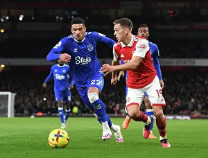Everton F Prints: Arsenal's Trossard Outmaneuvers Everton's Godfrey in Premier League Clash