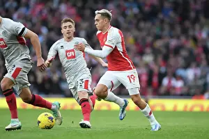 Arsenal's Trossard Sprints Past Sheffield United Defenders in 2023-24 Premier League Clash