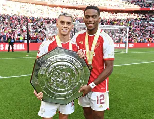 Arsenal's Trossard and Timber Celebrate Community Shield Victory over Manchester City