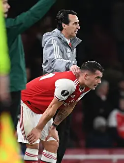 Arsenal's Unai Emery and Granit Xhaka: Leading the Team to Victory against Eintracht Frankfurt in the Europa League