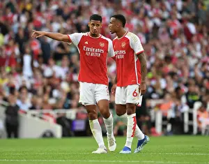 Arsenal's Unbeatable Duo: Saliba and Magalhaes in Action against Manchester City (2023-24)
