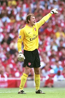 Arsenal's Unbeatable Wall: Jens Lehmann's Shut-Out in Arsenal's 3-0 Victory over Sheffield United, 2006