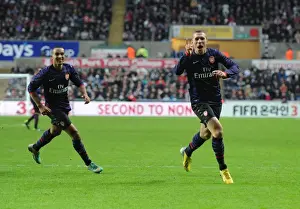 Swansea V Arsenal - FA Cup 3rd Rd 2012-13 Prints: Arsenal's Unforgettable FA Cup Goal Celebration: Podolski and Walcott's Emotional Moment at Swansea