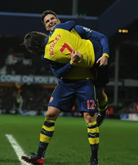 Queens Park Rangers V Arsenal 2014-15 Prints: Arsenal's Unforgettable Goal Celebration: Giroud and Rosicky's Emotional Moment (2014-15)