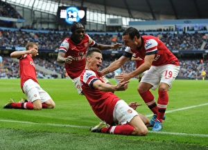 Arsenal's Unforgettable Goal: Koscielny, Gervinho, Cazorla, and Mertesacker's Euphoric Celebration vs Manchester City (2012)