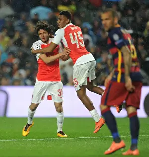 Barcelona V Arsenal 2015-16 Prints: Arsenal's Unforgettable Moment: Elneny and Iwobi Celebrate Goal Against Barcelona in Champions League