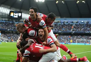 Arsenal's Unforgettable Moment: Koscielny's Goal Celebration with Team Mates Mertesacker, Gervinho, Cazorla, Arteta, Walcott, and Giroud
