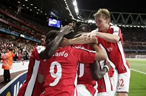 Images Dated 26th August 2009: Arsenal's Unforgettable Victory: Emmanuel Eboue's Exultant Moment after Scoring the Decisive Goal