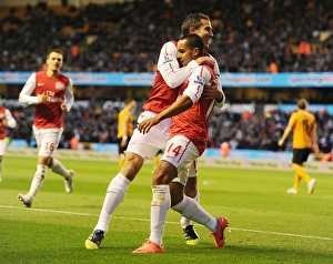 Arsenal's Unforgettable Victory: Walcott-van Persie's Dazzling Goal Celebration at Wolverhampton Wanderers, 2011-12 Premier League