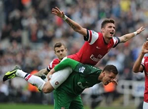 Newcastle United Collection: Arsenal's Unforgettable Victory: Giroud and Szczesny's Triumphant Celebration (Newcastle United)
