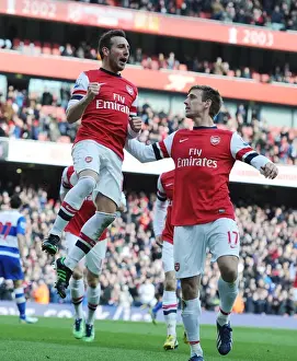 Arsenal V Reading 2012-13 Prints: Arsenal's Unforgettable Victory Dance: Santi Cazorla and Nacho Monreal's Jubilant Moment (2013)