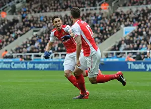 Newcastle United V Arseal 2014/15 Prints: Arsenal's Unforgettable Victory: Giroud and Gabriel's Jubilant Moment (2015)