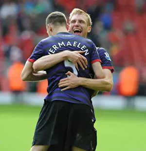 Arsenal's Unforgettable Victory: Vermaelen and Mertesacker's Emotional Celebration at Anfield, 2012-13 Premier League