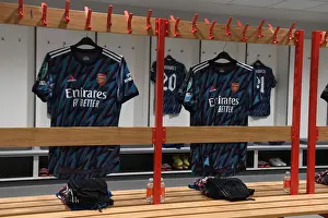 Arsenal's United Front: Pre-Match Huddle before Carabao Cup Semi-Final Clash with Liverpool at Anfield