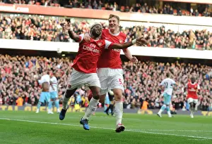 Arsenal V West Ham United 2010-11 Prints: Arsenal's Unstoppable Duo: Alex Song and Nicklas Bendtner Celebrate 1-0 Victory Over West Ham United