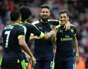 Sunderland V Arsenal 2016-17 Prints: Arsenal's Unstoppable Duo: Giroud and Ozil's Euphoric Goal Celebration (2016-17)