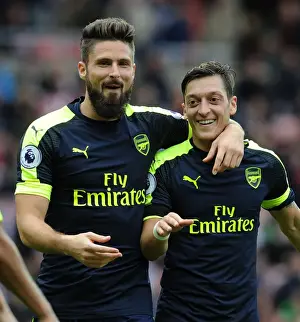 Sunderland V Arsenal 2016-17 Prints: Arsenal's Unstoppable Duo: Giroud and Ozil's Euphoric Goal Celebration (2016-17) - Sunderland vs