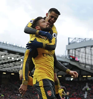 Images Dated 19th November 2016: Arsenal's Unstoppable Duo: Giroud and Sanchez Celebrate Goal Against Manchester United, 2016-17