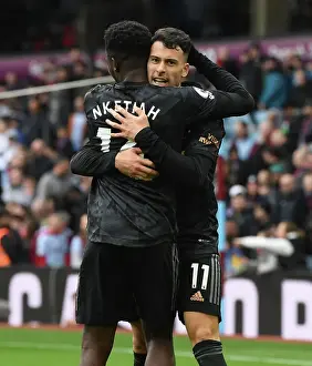 Aston Villa V Arsenal 2022-23 Prints: Arsenal's Unstoppable Duo: Martinelli and Nketiah Celebrate Four-Goal Lead Against Aston Villa (2022-23)