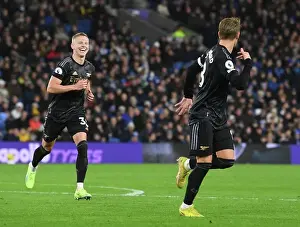 Arsenal's Unstoppable Duo: Odegaard and Zinchenko Celebrate Second Goal Against Brighton (December 2022)