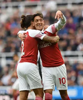Newcastle United V Arsenal 2018-19 Prints: Arsenal's Unstoppable Duo: Ozil and Bellerin Celebrate Goal vs Newcastle United (2018-19)
