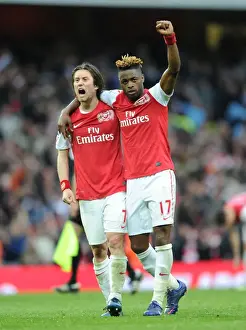 Arsenal V Manchester City 2011-12 Prints: Arsenal's Unstoppable Duo: Rosicky and Song Celebrate Epic Victory over Manchester City (2011-12)