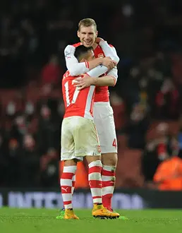 Arsenal V Southampton 2014-15 Prints: Arsenal's Unstoppable Duo: Sanchez and Mertesacker Celebrate Victory (2014-15)