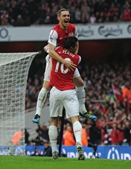 Arsenal v West Bromwich Albion 2011-12 Collection: Arsenal's Unstoppable Duo: Vermaelen and van Persie's Goal Celebration (2011-12)
