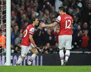 Manchester City Collection: Arsenal's Unstoppable Partnership: Flamini and Giroud's Goal Celebration vs Manchester City