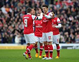 Arsenal's Unstoppable Striking Partnership: Giroud and Podolski Celebrate First Goal in FA Cup Victory (2012-13)
