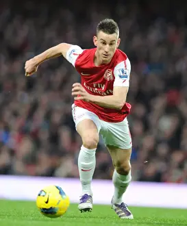 Arsenal's Unyielding Defender: Koscielny's Brilliant Performance Against Wolverhampton Wanderers (2011-2012)