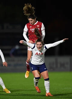 Images Dated 18th November 2020: Arsenal's Van de Donk Soars Above Tottenham in Empty FA WSL Cup Match
